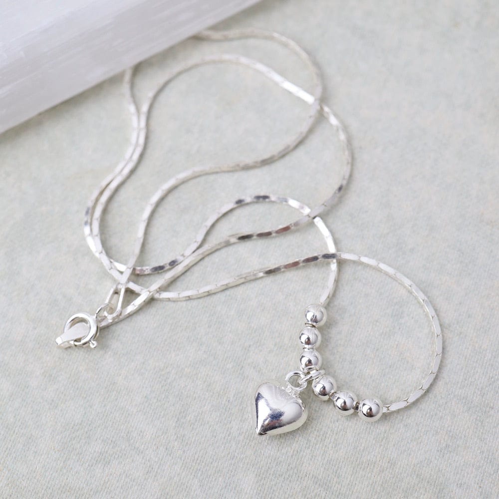 
                      
                        NKL Sterling Silver Heart and Beads Necklace
                      
                    