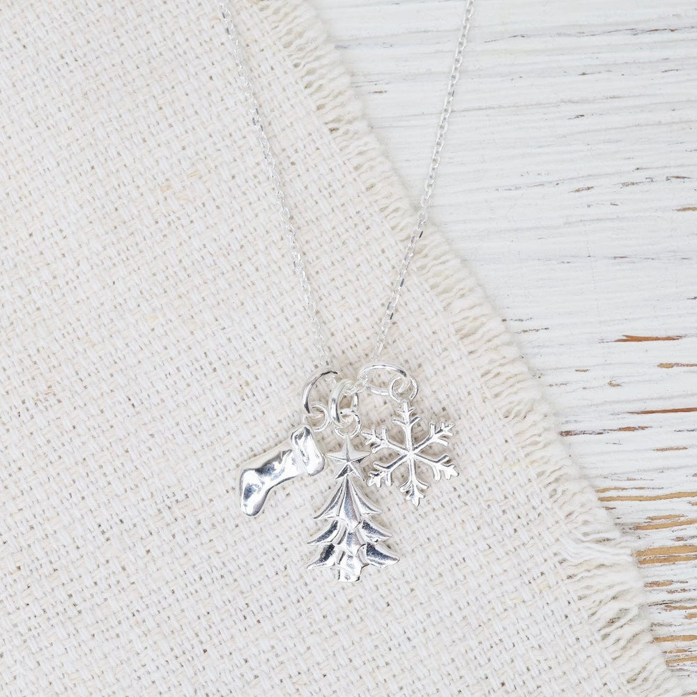 
                  
                    NKL Sterling Silver Holiday Charm Necklace
                  
                