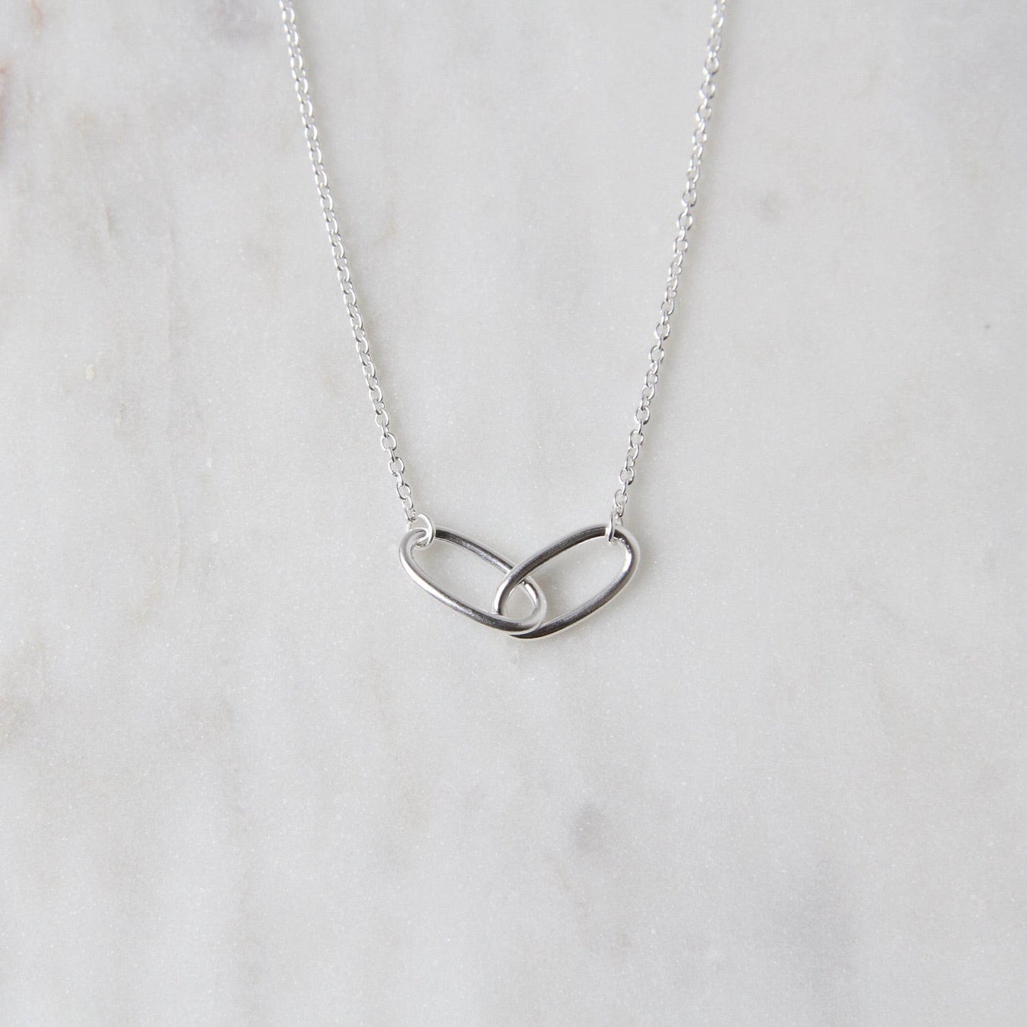 NKL Sterling Silver Interlocking Ovals Necklace