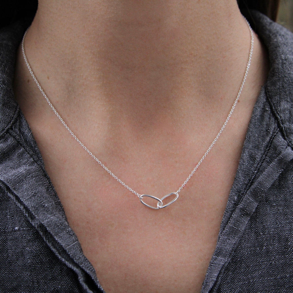 
                      
                        NKL Sterling Silver Interlocking Ovals Necklace
                      
                    