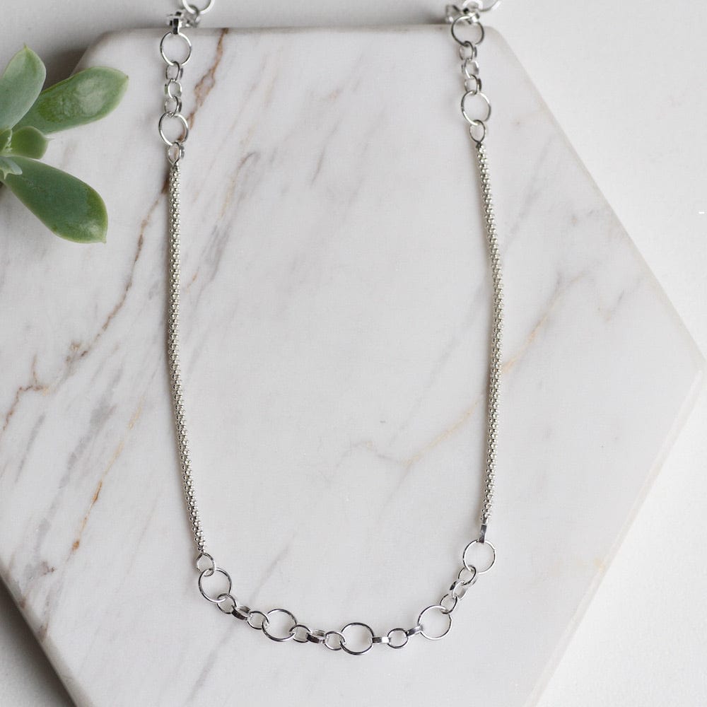 
                  
                    NKL Sterling Silver Mesh Chain with Open Ring Chain Stations
                  
                