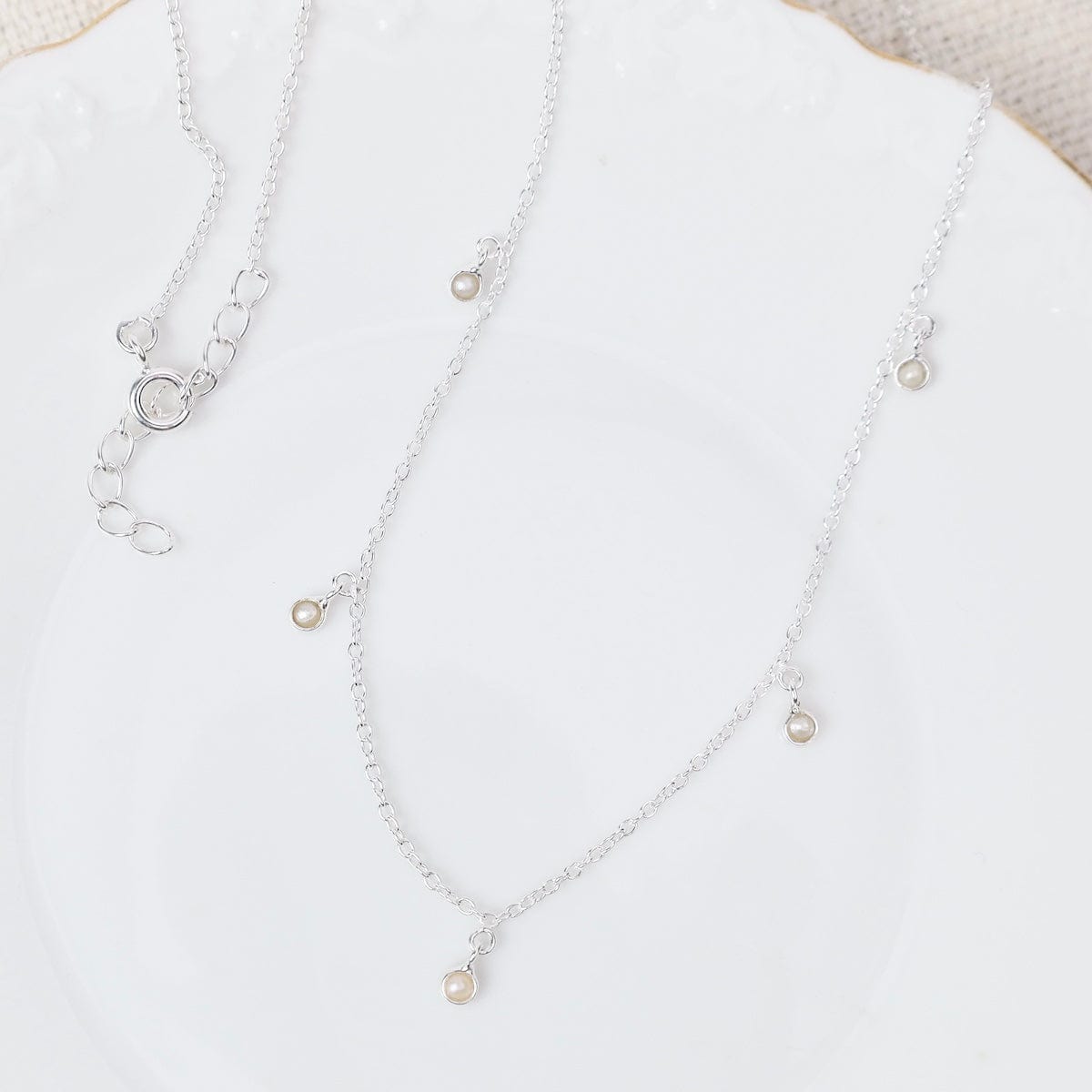 NKL Sterling Silver Necklace with 5 Bezel Set Drops -