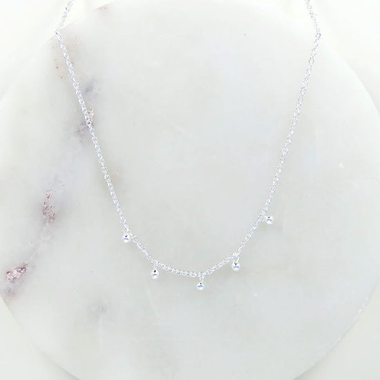 NKL Sterling Silver Necklace With 5 Tiny Charms