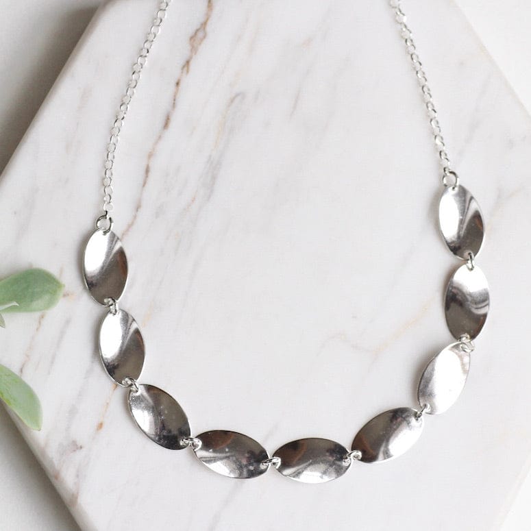 
                  
                    NKL Sterling Silver Necklace with Oval Tabs
                  
                