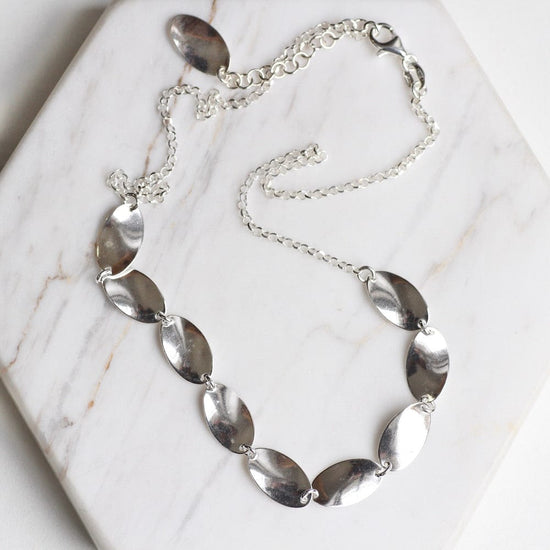 NKL Sterling Silver Necklace with Oval Tabs