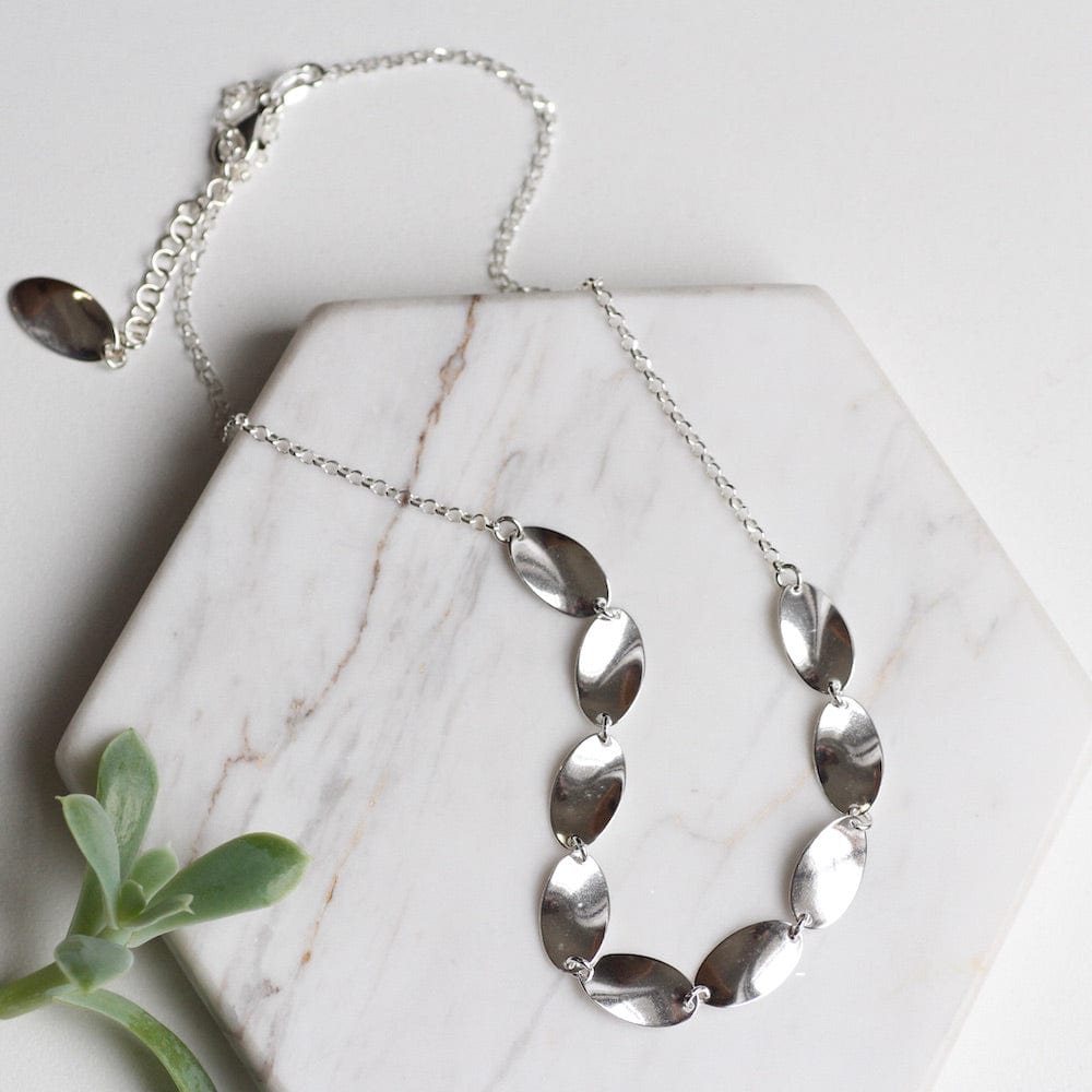 
                  
                    NKL Sterling Silver Necklace with Oval Tabs
                  
                