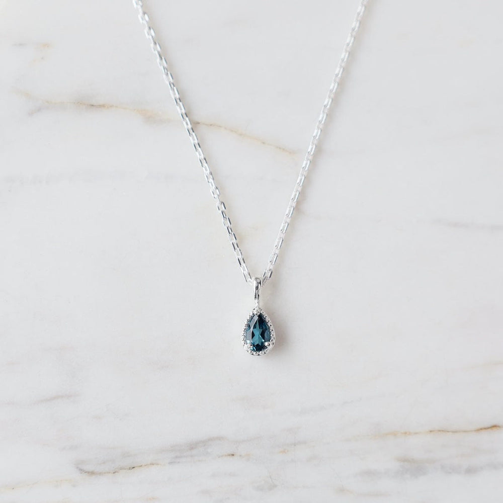 NKL Sterling Silver Pear Cut London Blue Topaz with Milgrain Edge Necklace