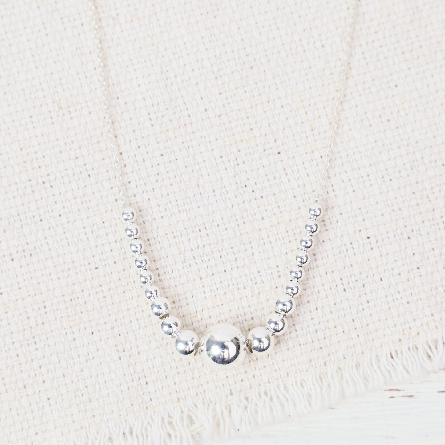 NKL Sterling Silver Petite Graduated Balls Necklace