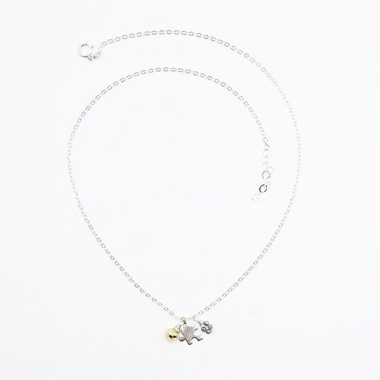 NKL Sterling Silver Puzzle & Stone Charm Necklace