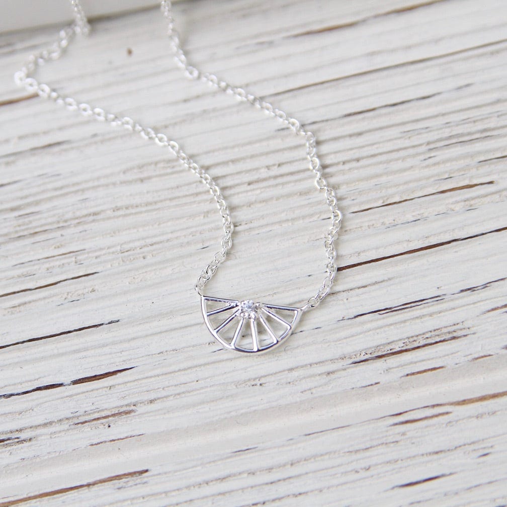 NKL Sterling Silver Spoked Half Wheel with Center CZ Necklace