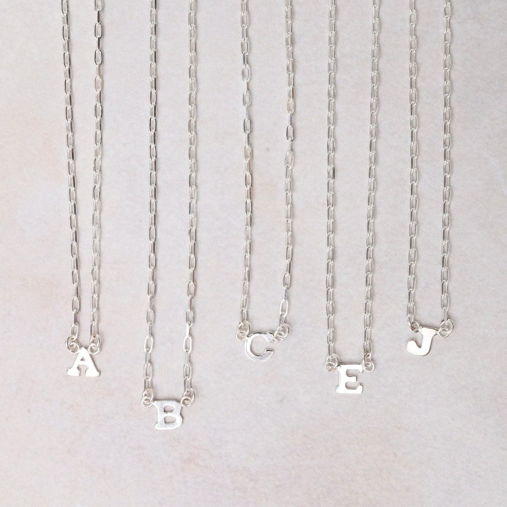 
                      
                        nkl Sterling Silver Station Letter Necklace
                      
                    