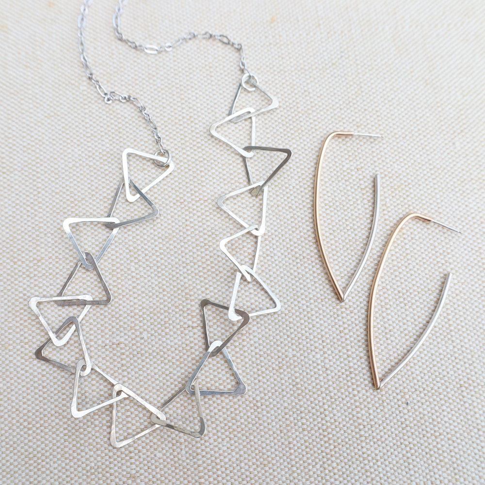 
                  
                    NKL Sterling Silver Triangle Link Necklace
                  
                