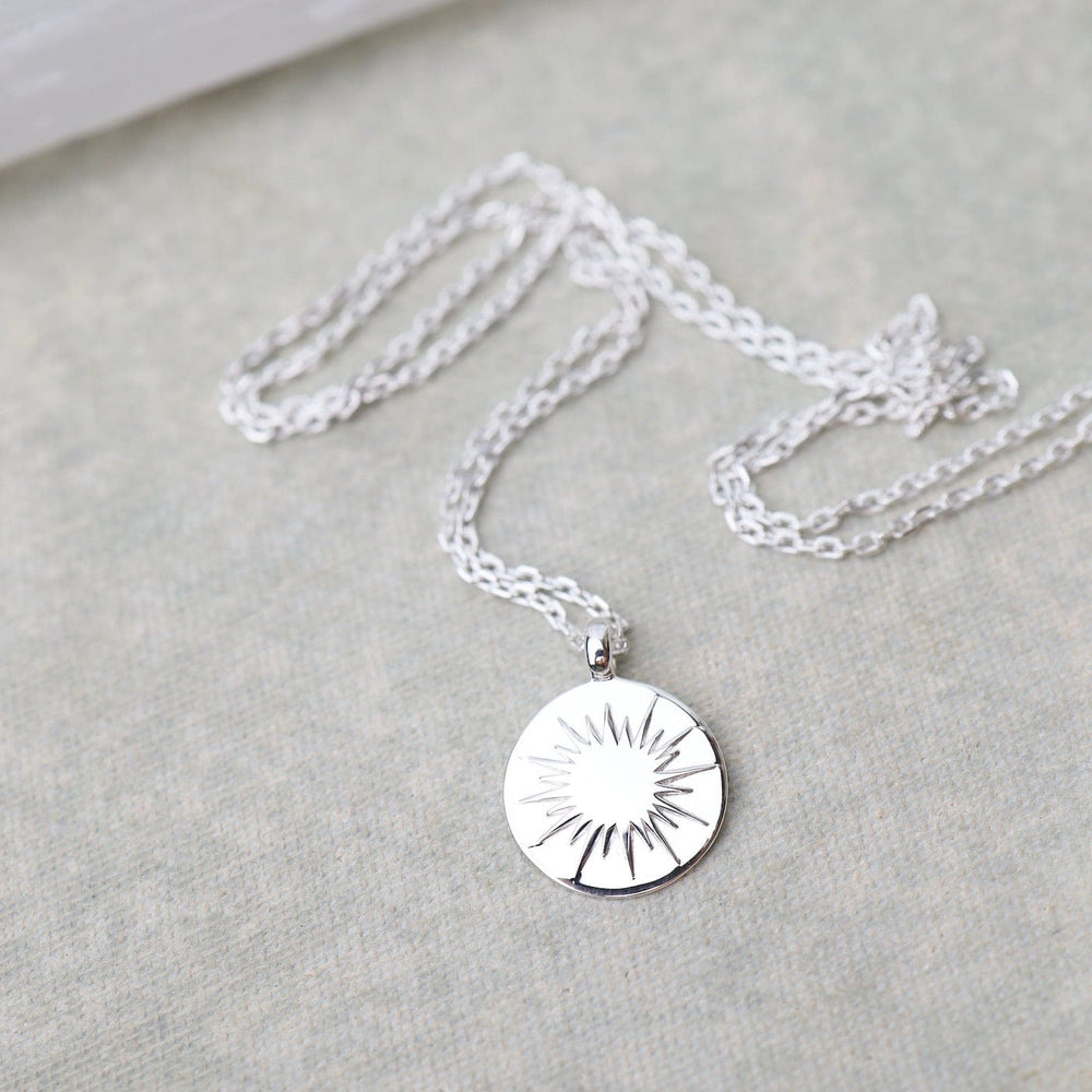 
                      
                        NKL Sunburst Medallion Necklace - Sterling Silver
                      
                    