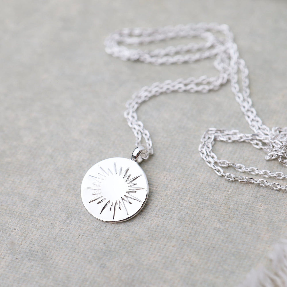 
                      
                        NKL Sunburst Medallion Necklace - Sterling Silver
                      
                    