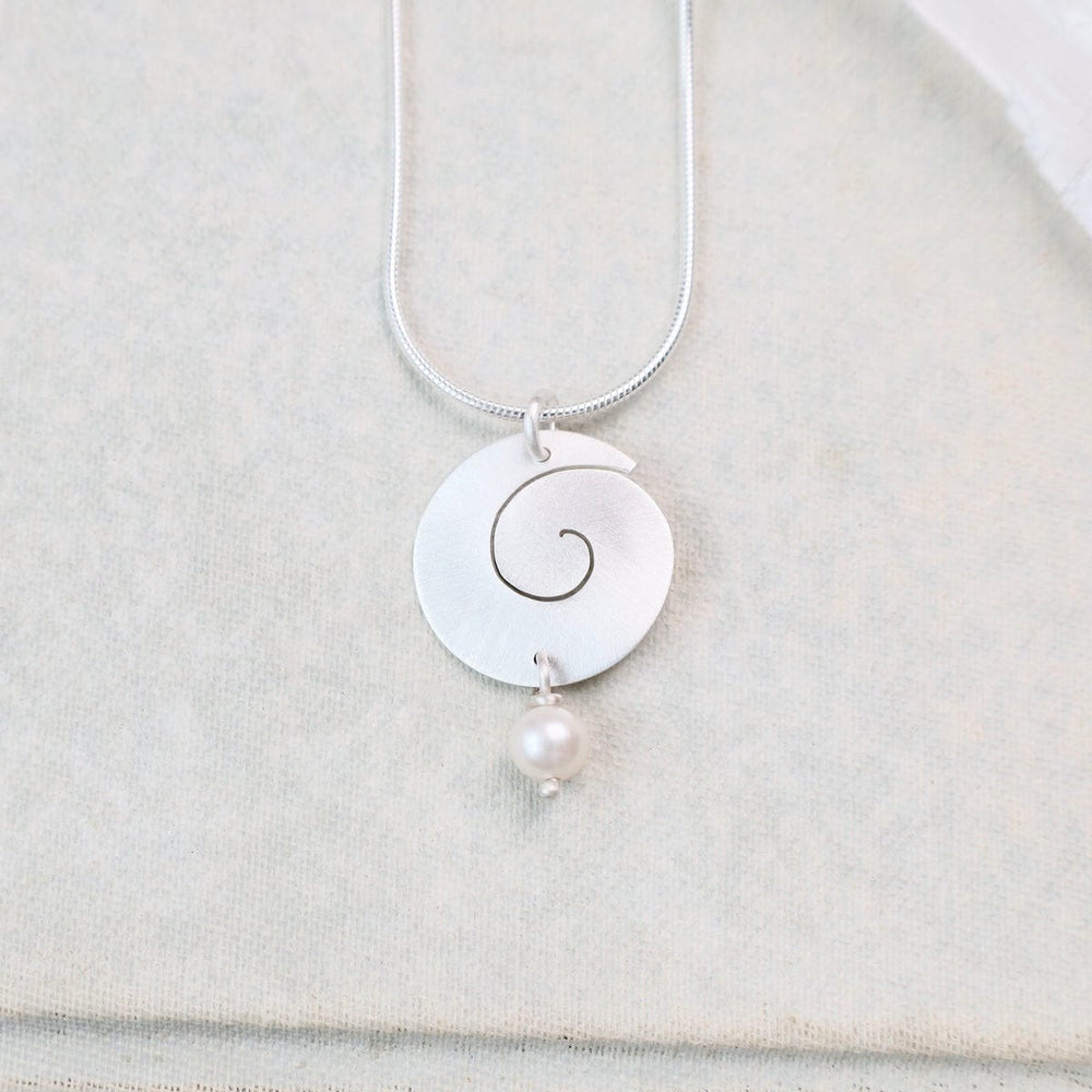 
                      
                        NKL SWIRL PENDAND WITH PEARL DROP
                      
                    