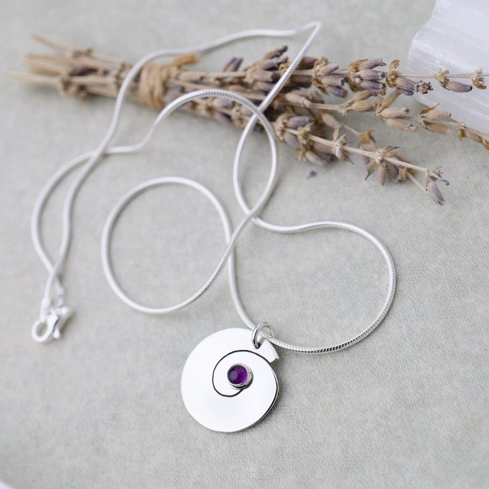 
                      
                        NKL Swirl Pendant with Amethyst
                      
                    