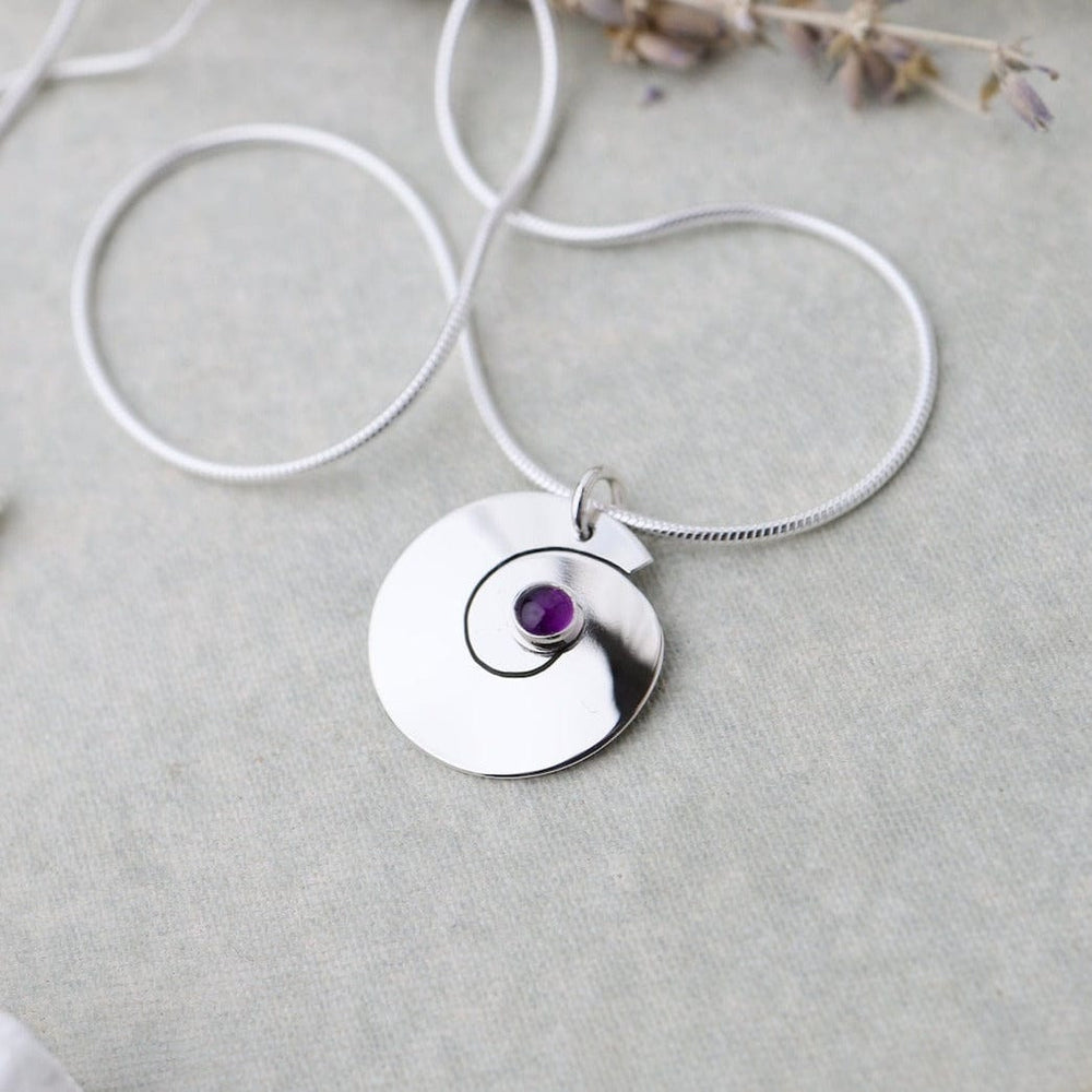 
                      
                        NKL Swirl Pendant with Amethyst
                      
                    