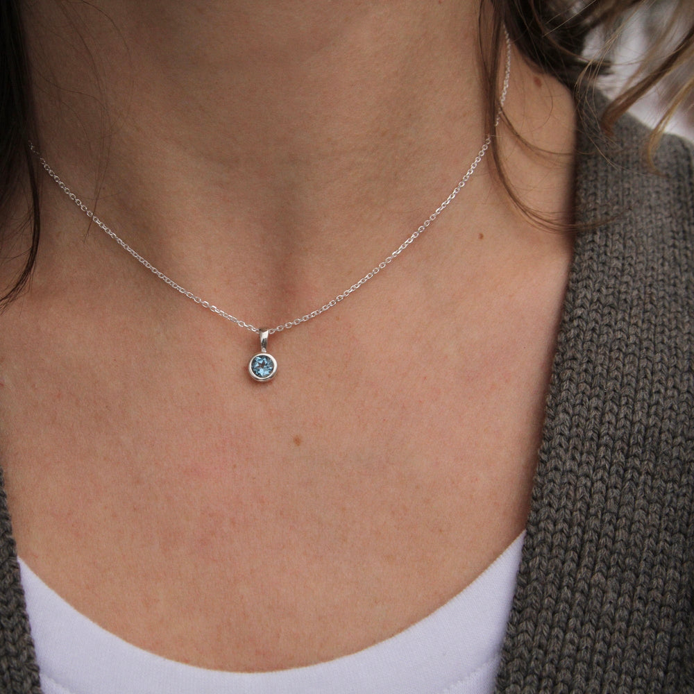 NKL Swiss Blue Topaz Pendant