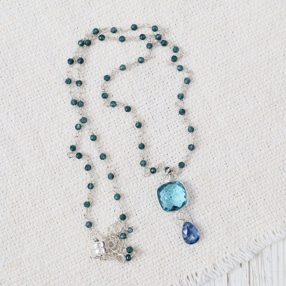 
                  
                    NKL Swiss Blue Topaz Square Silver Bezel Necklace
                  
                