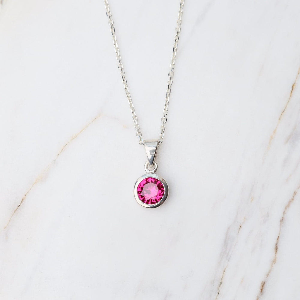 
                      
                        NKL Synthetic Ruby Dot Pendant
                      
                    