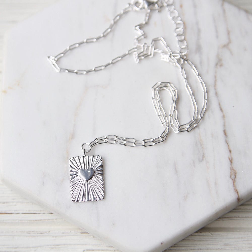 NKL Tablet with Heart & Rays Pendant on Parallel Chain