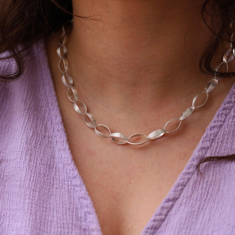 
                      
                        NKL Teardrop Link Necklace
                      
                    