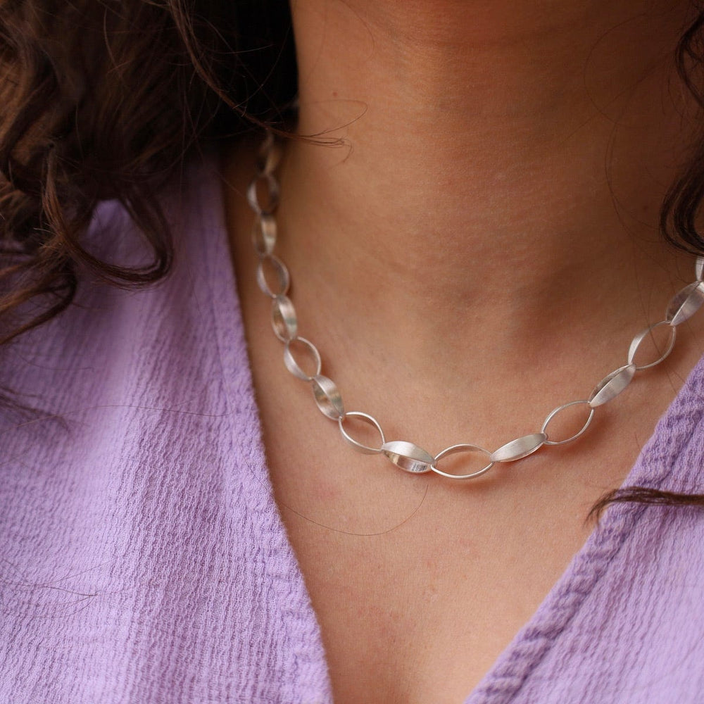 
                      
                        NKL Teardrop Link Necklace
                      
                    