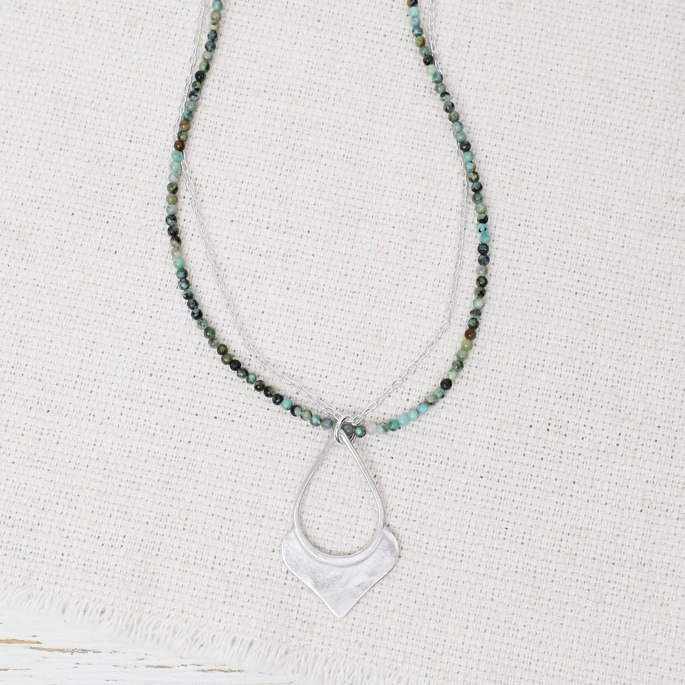 NKL Teardrop Pendant On Turquoise and Chain