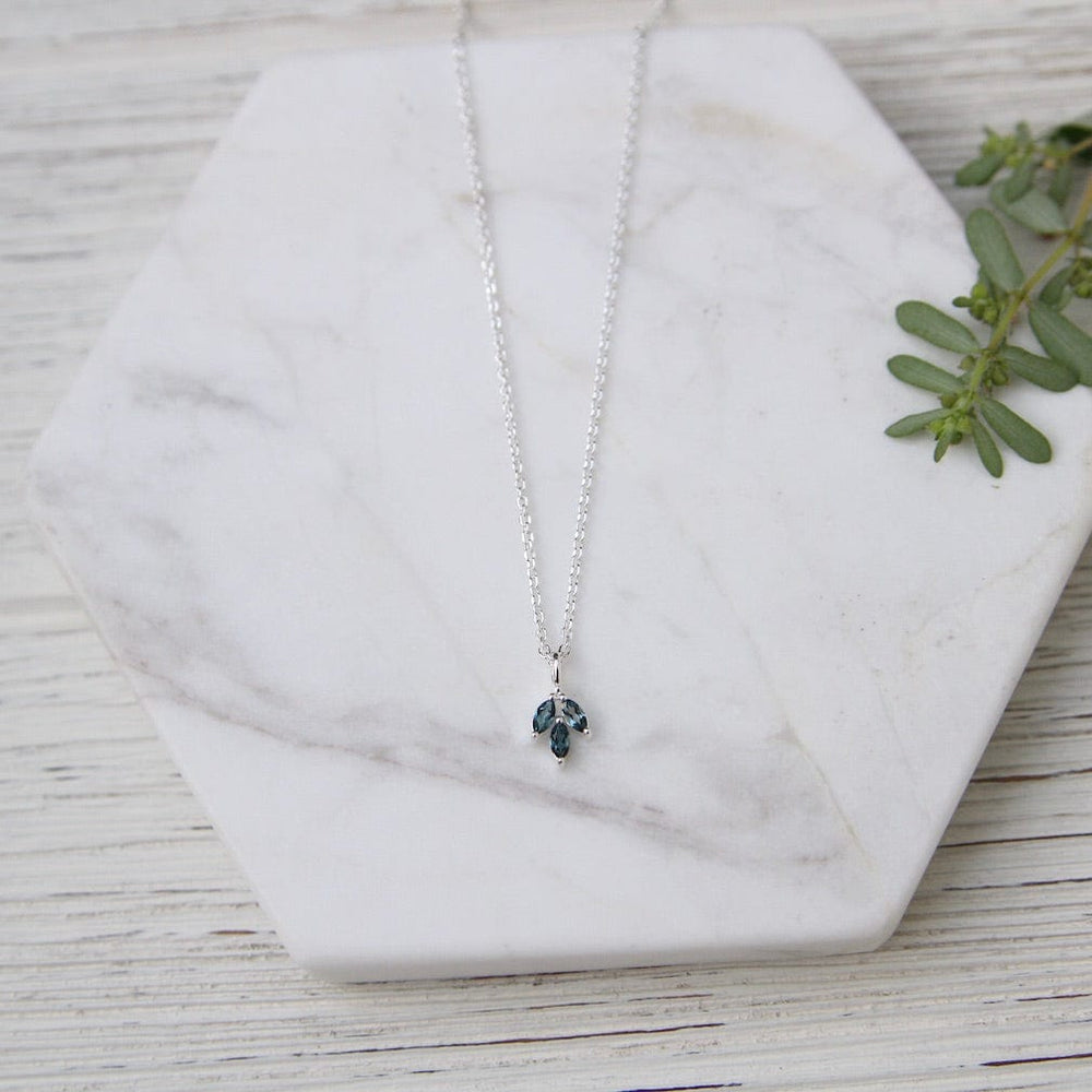 
                  
                    NKL Three Leaf Marquis London Blue Topaz Necklace
                  
                