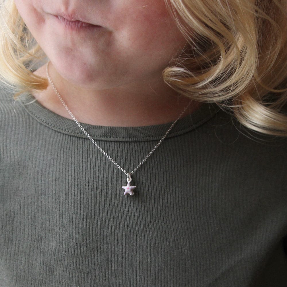 
                      
                        NKL Tiny Purple Star Necklace with Flower
                      
                    