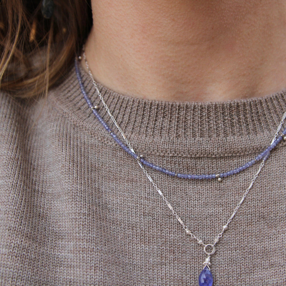 
                      
                        NKL Tiny Tanzanite Drop Necklace
                      
                    