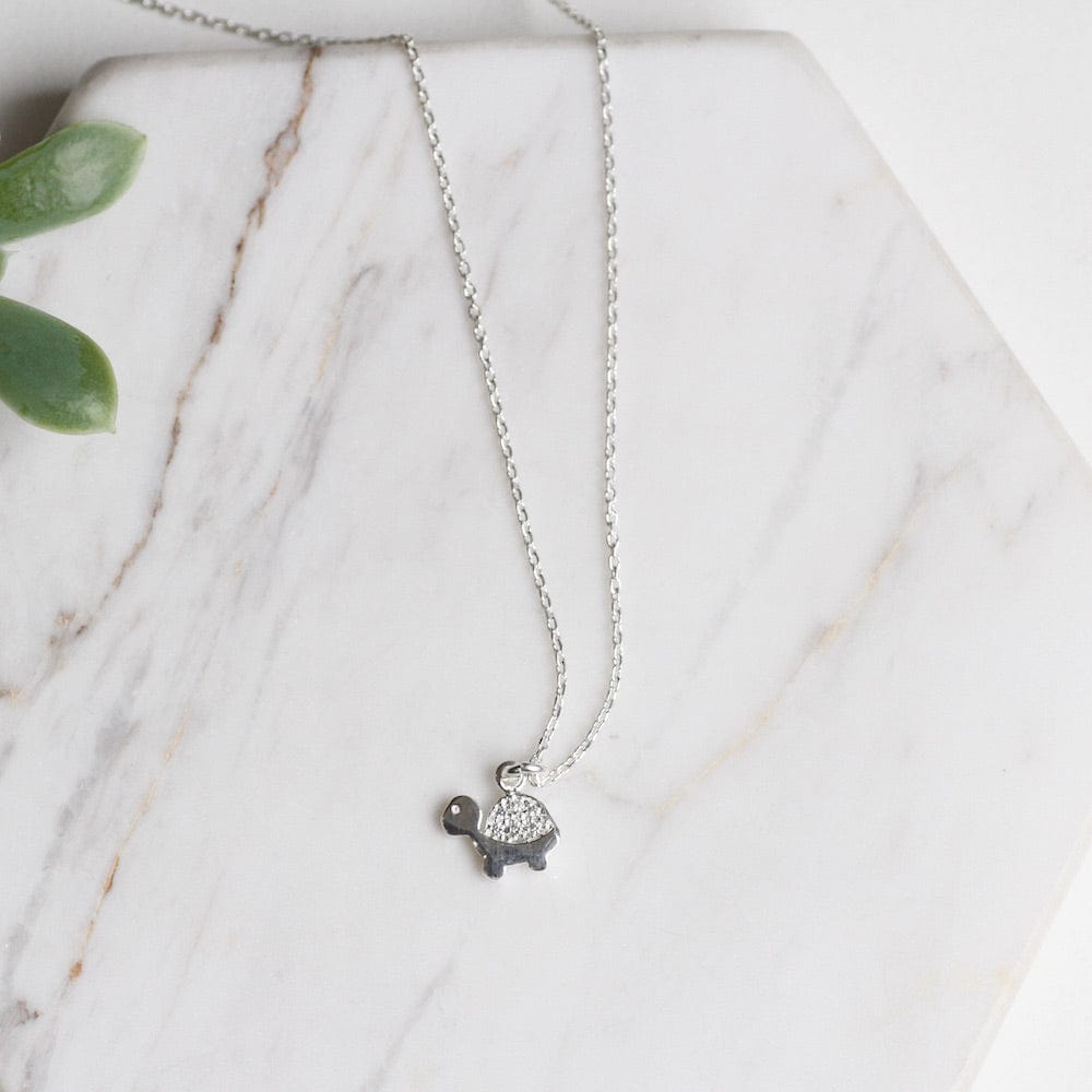 
                  
                    NKL Tiny Turtle Necklace
                  
                