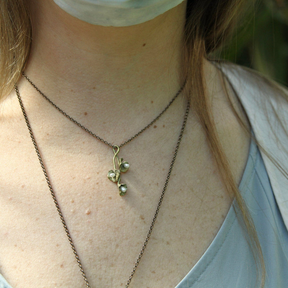 
                  
                    424 NKL Trailing Licorice Dainty Pendant
                  
                