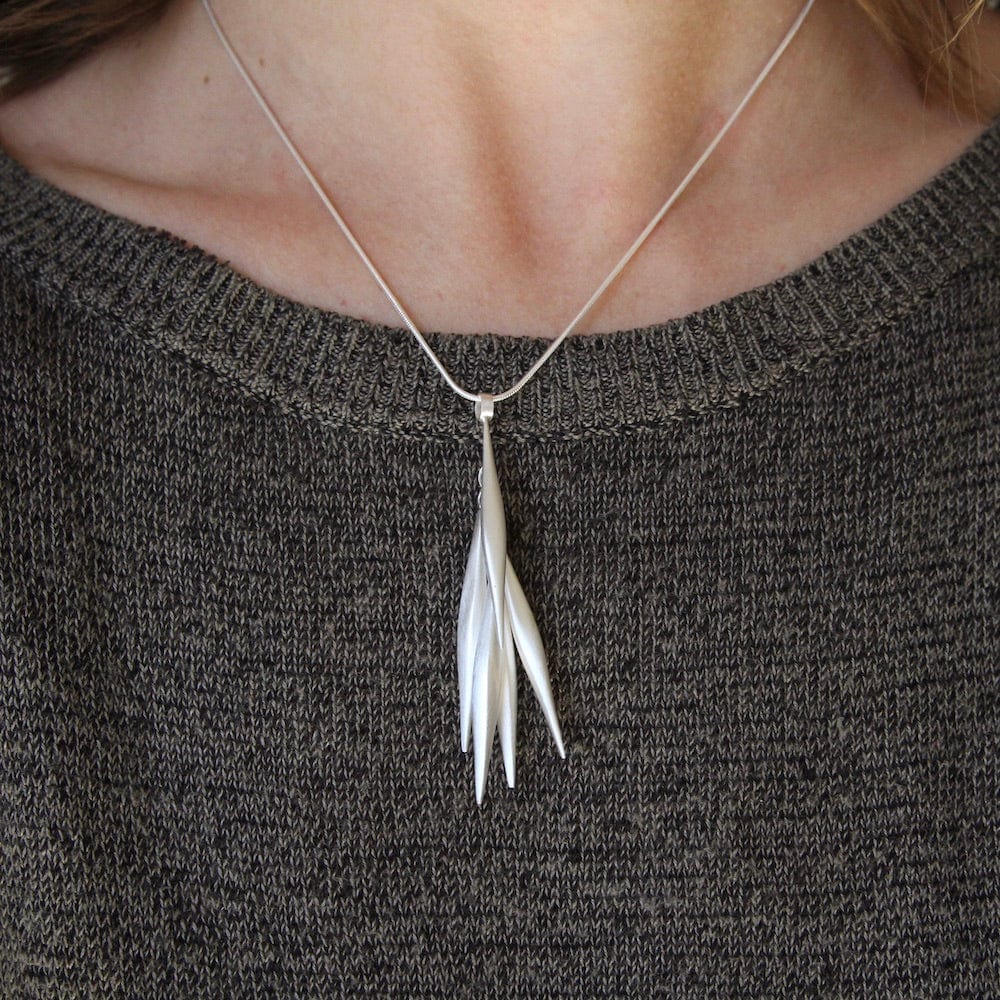 
                      
                        NKL Tube Tassel Pendant
                      
                    