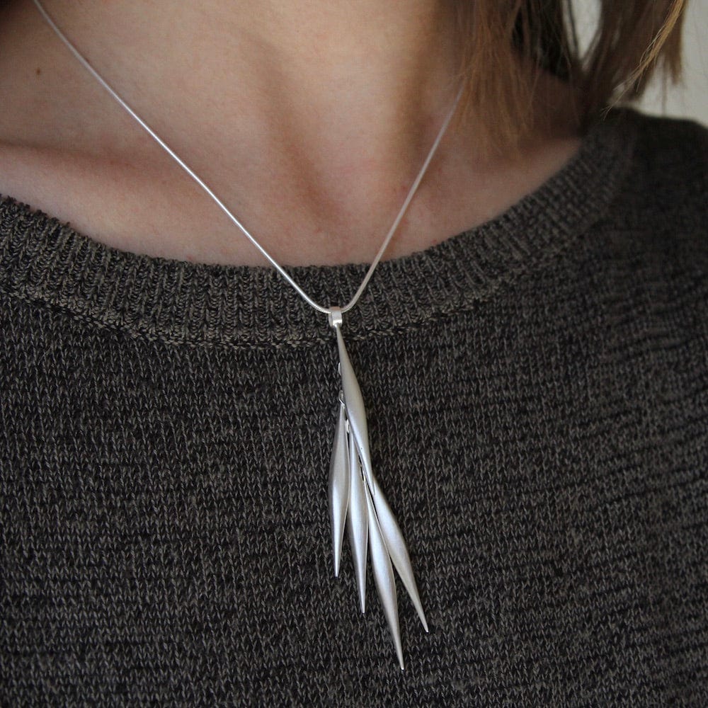 
                      
                        NKL Tube Tassel Pendant
                      
                    