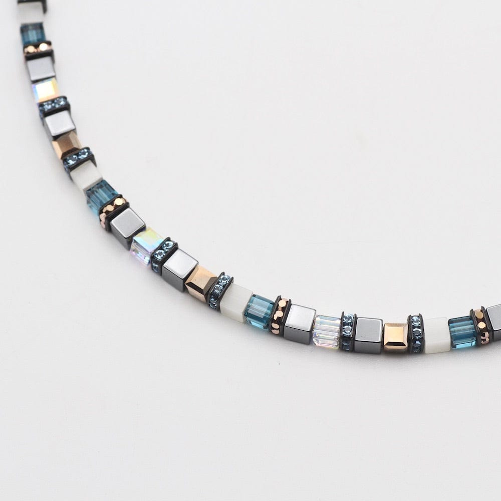 
                      
                        NKL TURQUOISE AND HEMATITE SMALL GEO CUBE NECKLACE
                      
                    