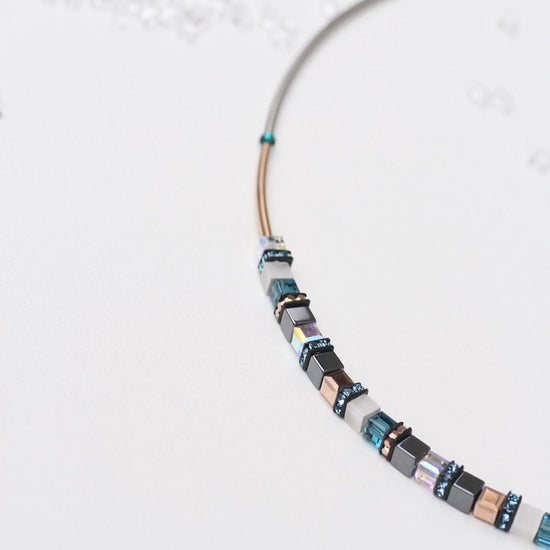 NKL TURQUOISE AND HEMATITE SMALL GEO CUBE NECKLACE