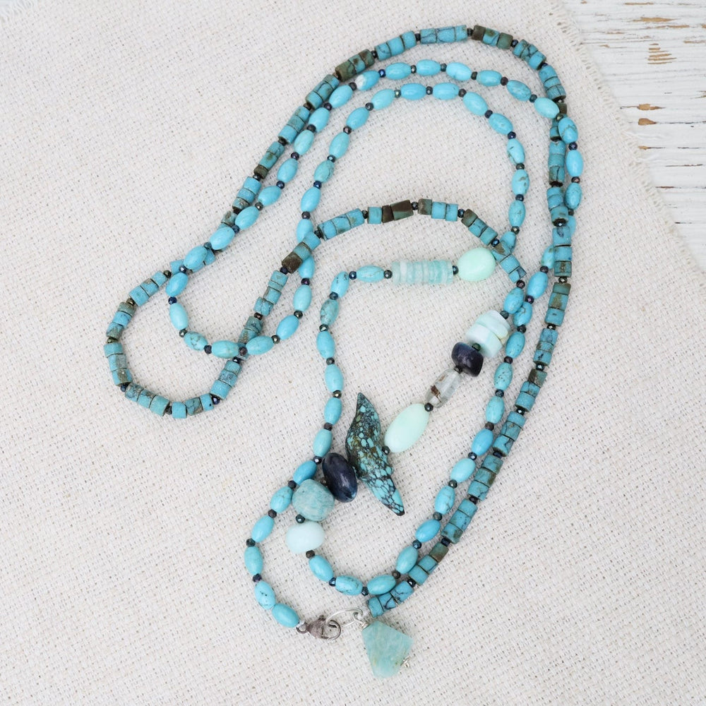 
                  
                    NKL Turquoise Bird Necklace
                  
                