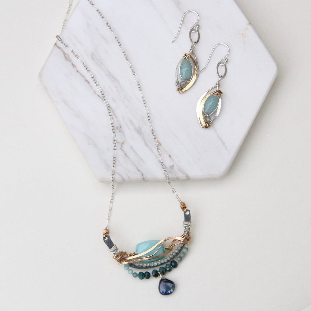 
                  
                    NKL Turquoise Crystal Arch Wrapped Necklace
                  
                