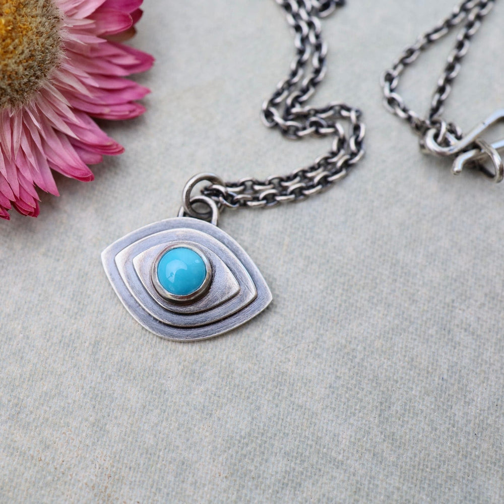 
                      
                        NKL Turquoise Inner Vison Necklace
                      
                    