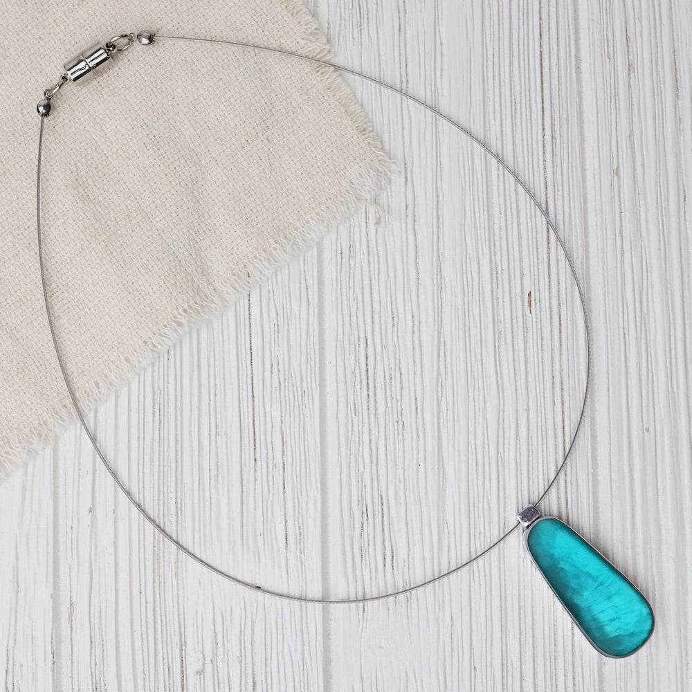 
                  
                    NKL Turquoise Oval Pendant Necklace
                  
                