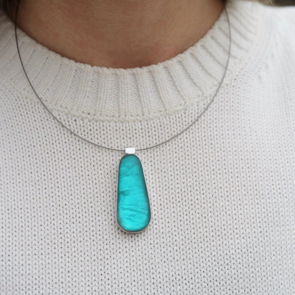 
                  
                    NKL Turquoise Oval Pendant Necklace
                  
                