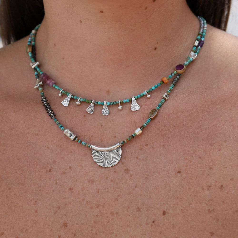 
                      
                        NKL Turquoise with Raindrops & Triangles Necklace
                      
                    