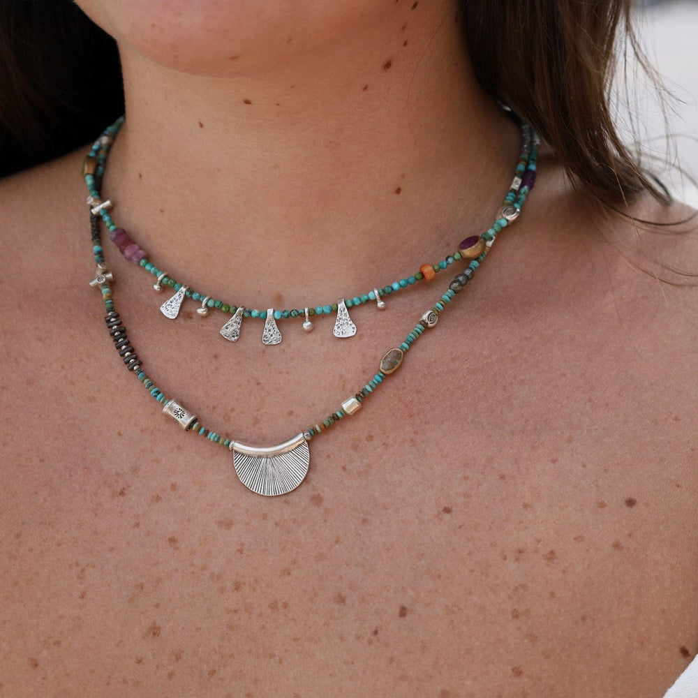 
                      
                        NKL Turquoise with Raindrops & Triangles Necklace
                      
                    