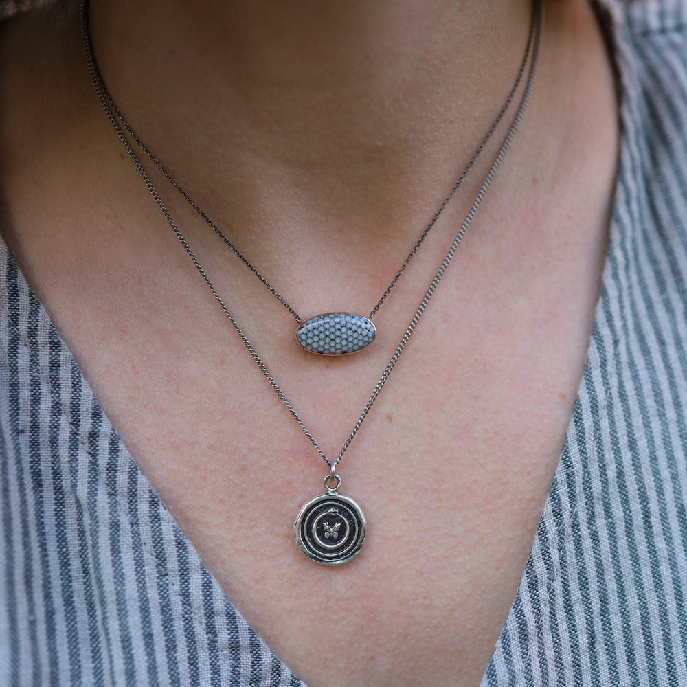 
                  
                    NKL Uncrushable Talisman Necklace
                  
                