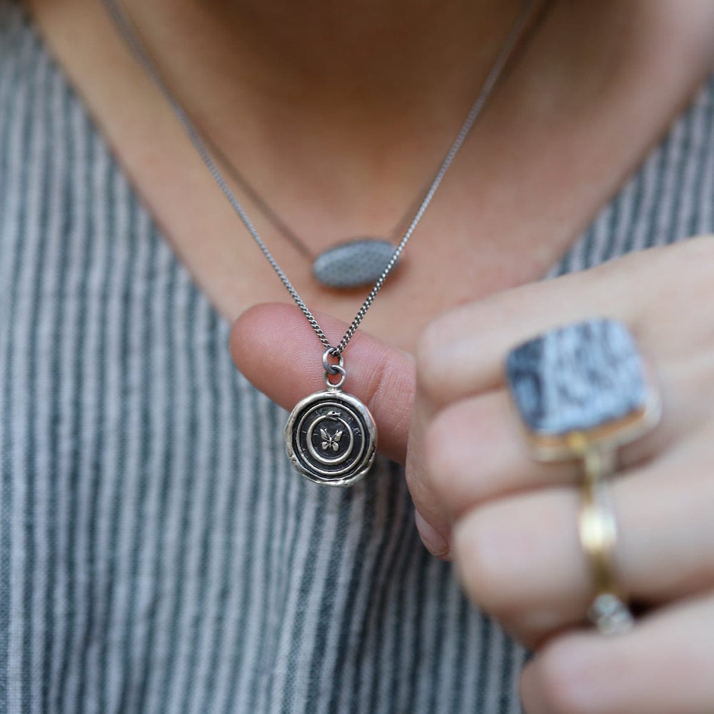 
                  
                    NKL Uncrushable Talisman Necklace
                  
                