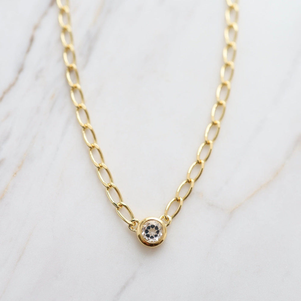 
                  
                    NKL-VRM Bezel Set Round White Topaz on Gold Vermeil Cut Curb Chain
                  
                