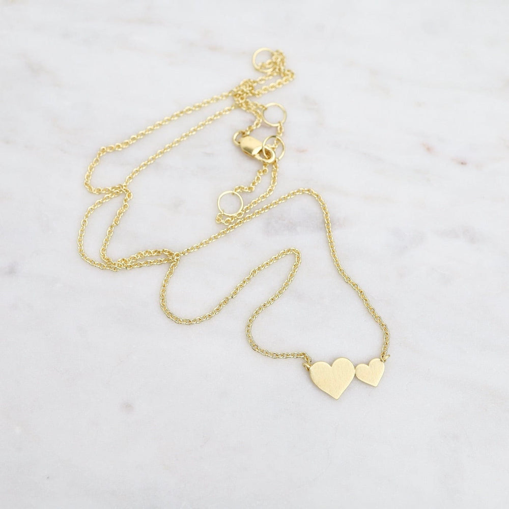 
                  
                    NKL-VRM Brushed Vermeil Big & Little Hearts Necklace
                  
                