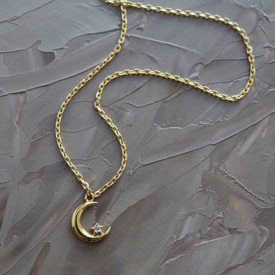 NKL-VRM Crescent Moon with Single CZ in Gold Vermeil
