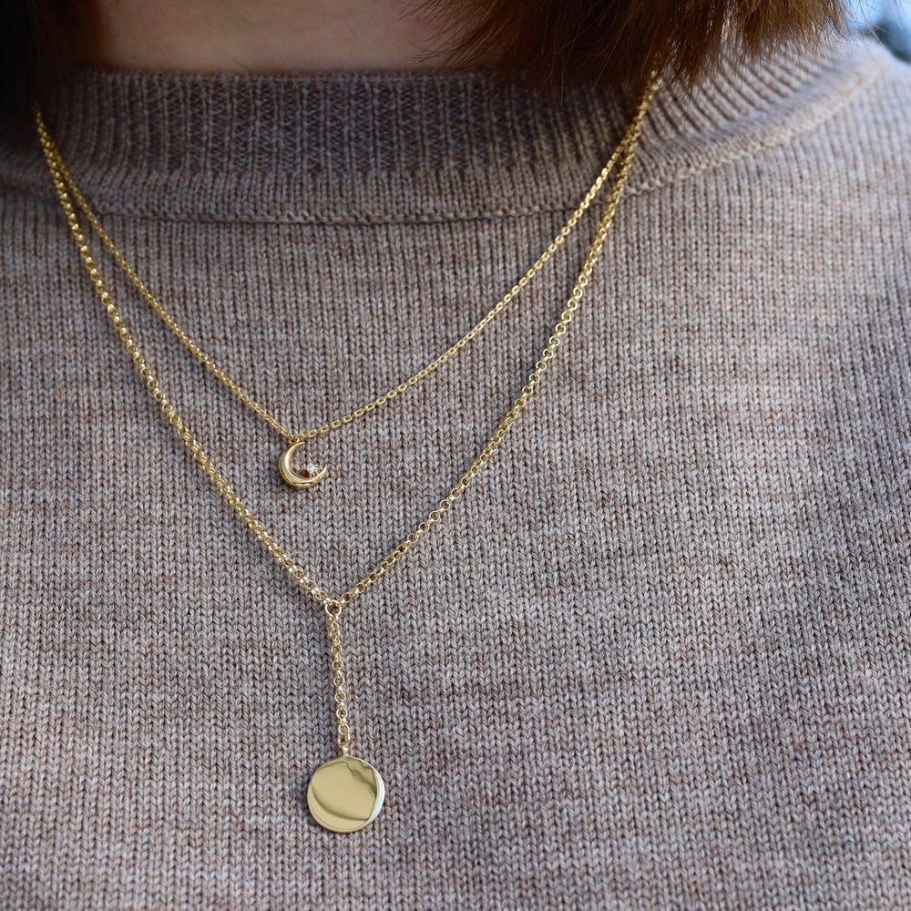 
                  
                    NKL-VRM Crescent Moon with Single CZ in Gold Vermeil
                  
                